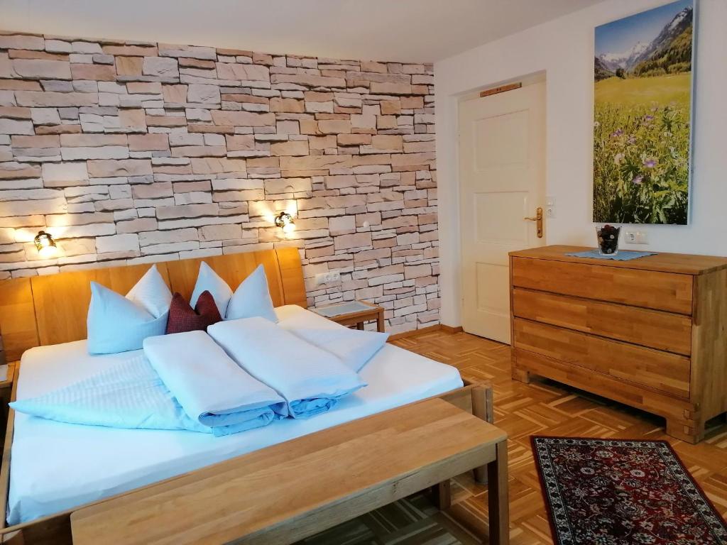 Posteľ alebo postele v izbe v ubytovaní Ferienwohnung Bacher