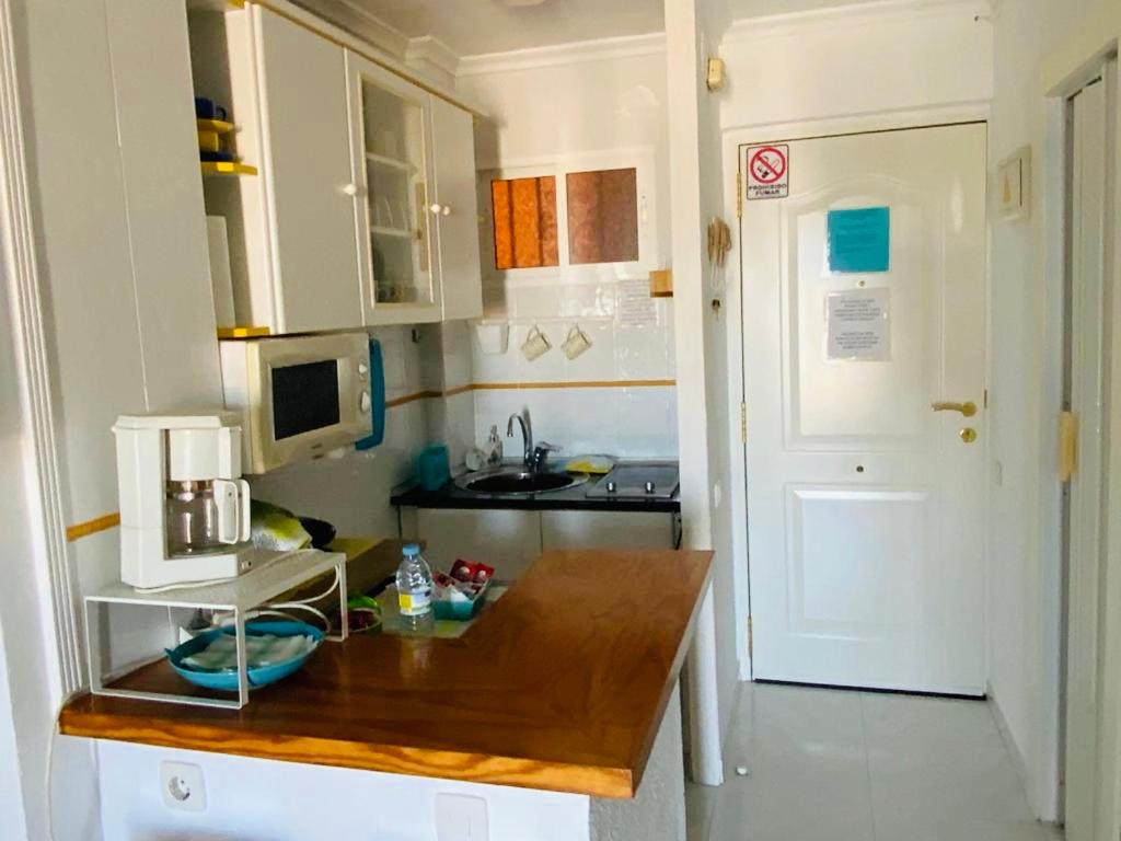Kuchyň nebo kuchyňský kout v ubytování Estudio muy acogedor en Benalmádena
