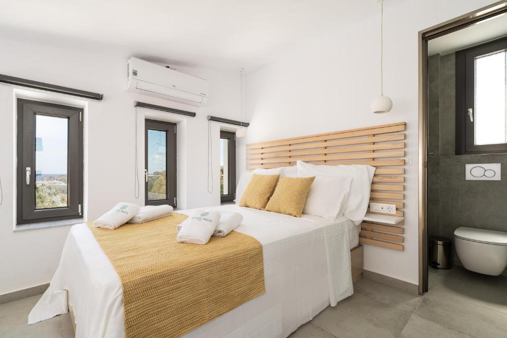 Posteľ alebo postele v izbe v ubytovaní Askelinos Villas
