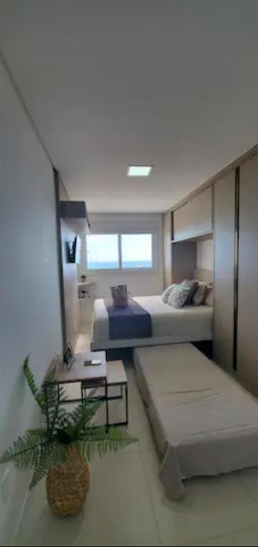  Apartamento NOVO com vista PANORAMICA da praia.