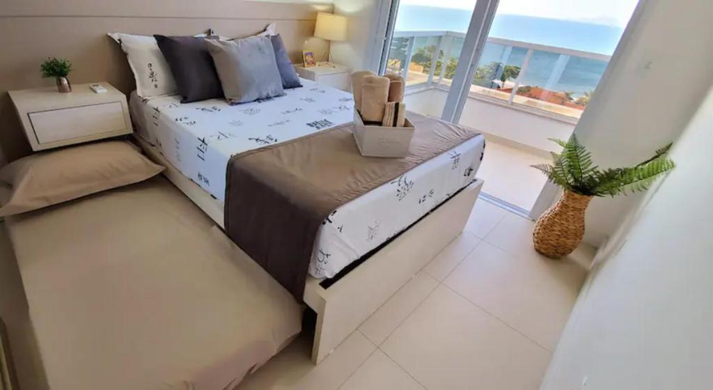  Apartamento NOVO com vista PANORAMICA da praia.