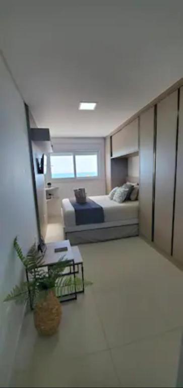  Apartamento NOVO com vista PANORAMICA da praia.