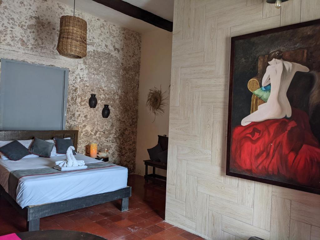 Postel nebo postele na pokoji v ubytování Casa Aluxes Hotel