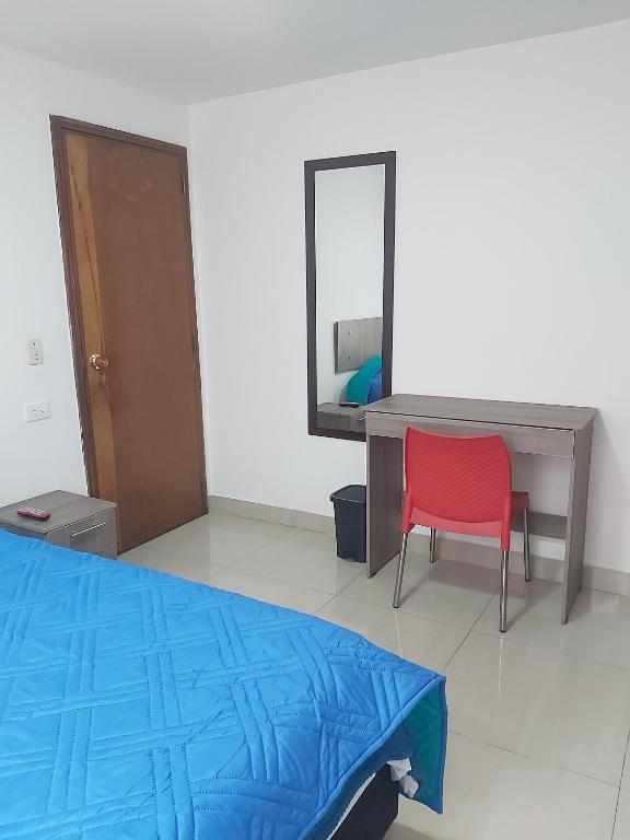 Postel nebo postele na pokoji v ubytování Hospedaje Sary House