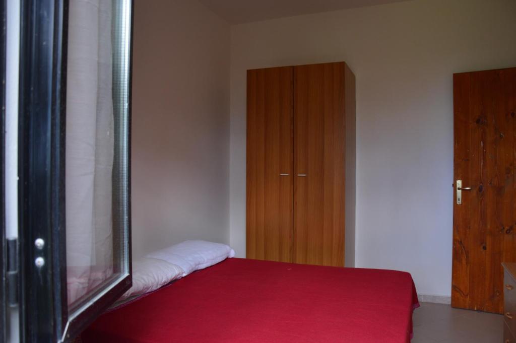 Postel nebo postele na pokoji v ubytování Lido Villaggio il Ragno