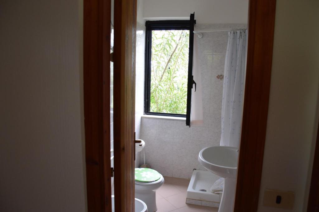 Koupelna v ubytování Lido Villaggio il Ragno