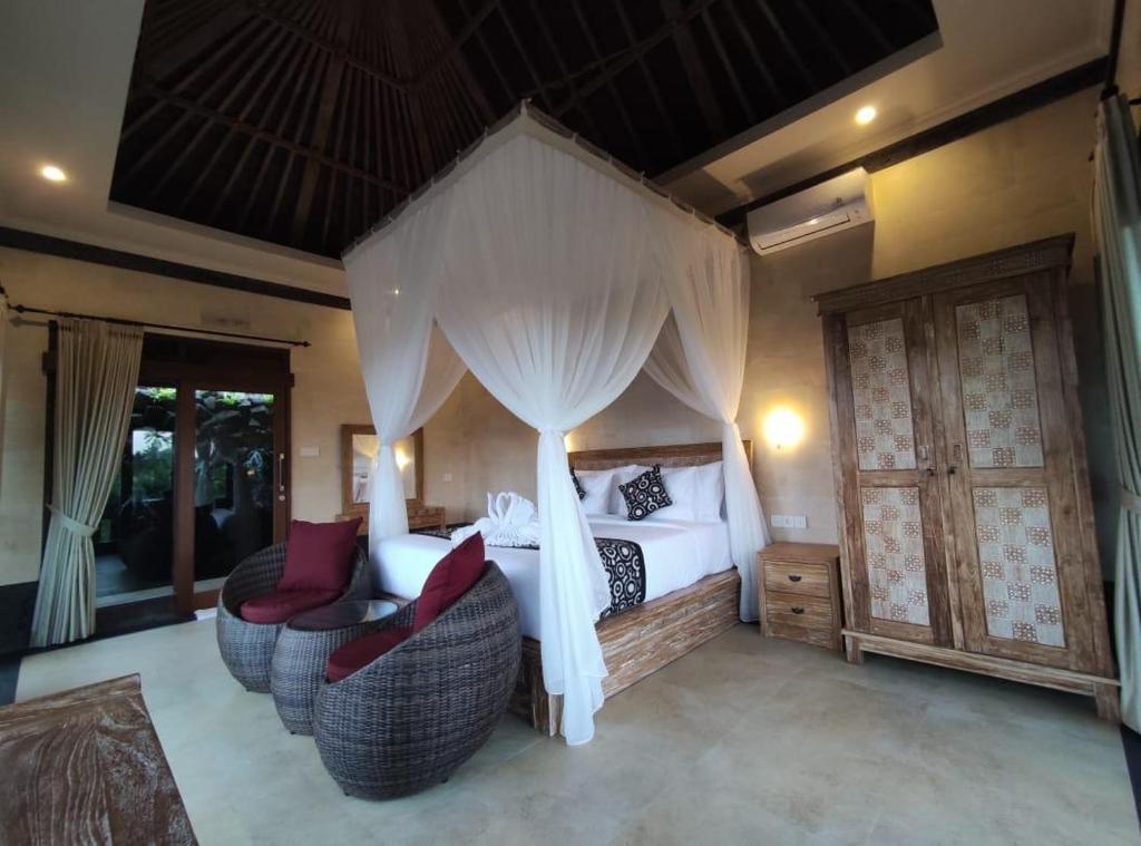 Posezení v ubytování Anggarakasih Ubud Villa