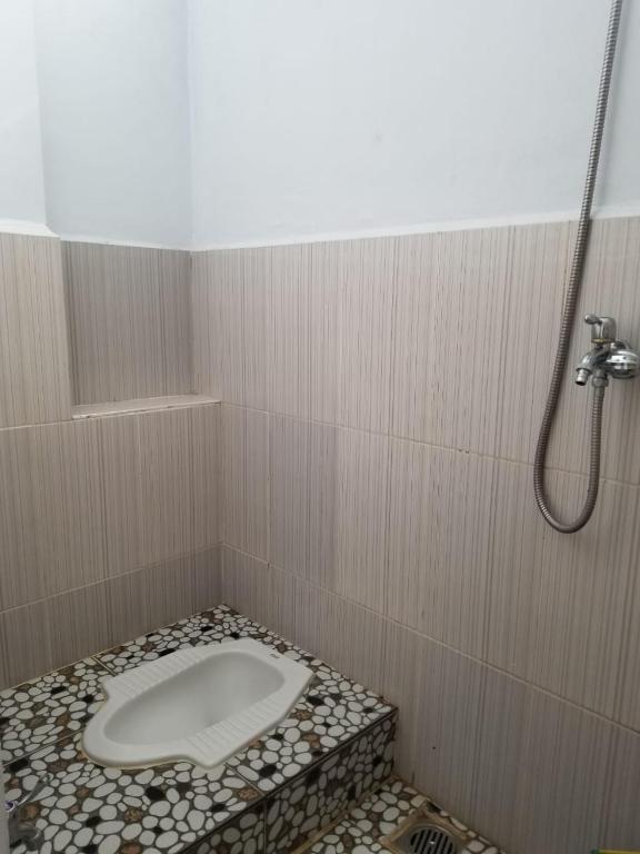 Koupelna v ubytování AUR KUNING HOSTEL SYARIAH Bukittinggi