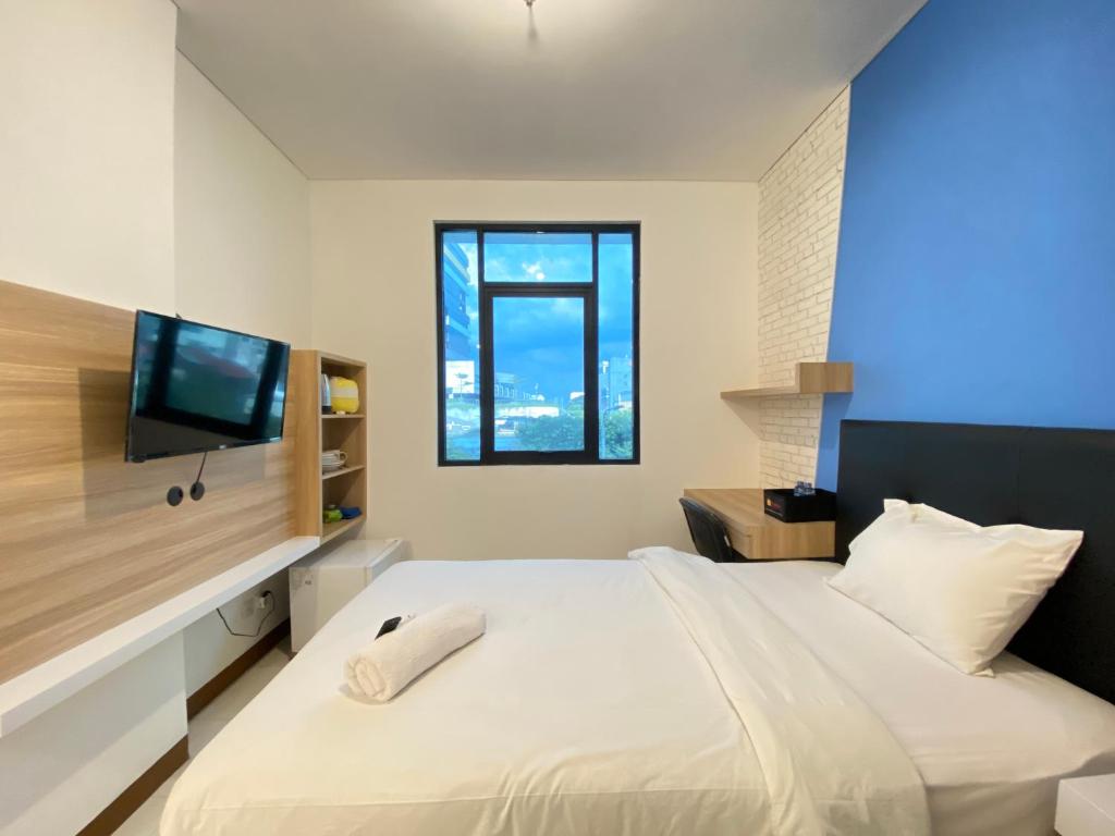 Smart Studio Room Semi Apartment at The Lodge Paskal near BINUS University By Travelio - Studio Apartment