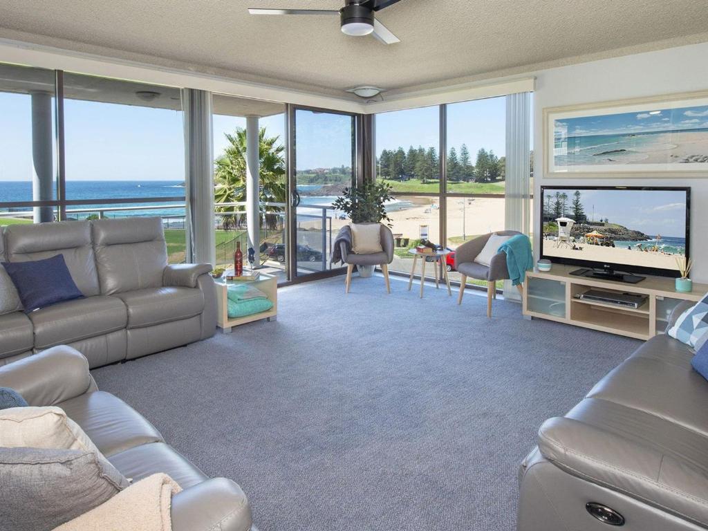 A seating area at At The Beach - Kiama Surf Beach at your doorstep