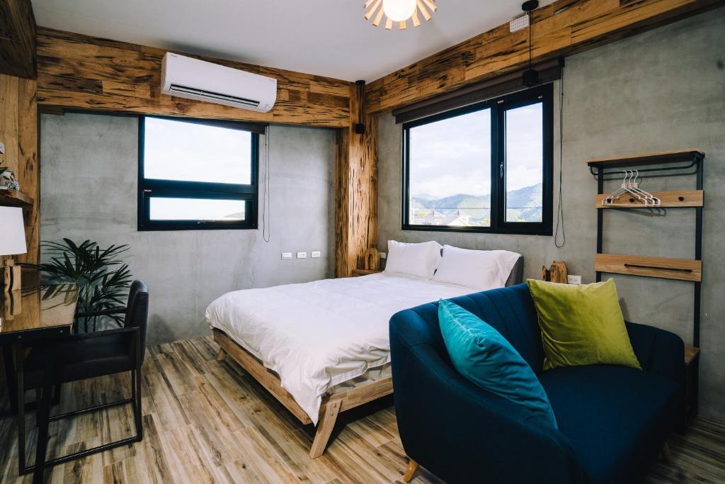Postel nebo postele na pokoji v ubytování 似禾苑民宿 Siheyuan Homestay