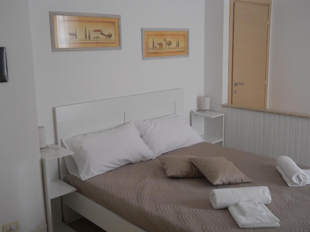 Postel nebo postele na pokoji v ubytování B&B Cielo & Mare