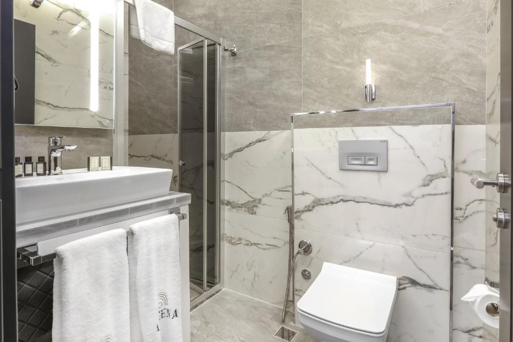 Ванная комната в Aileena Hotel & Villas