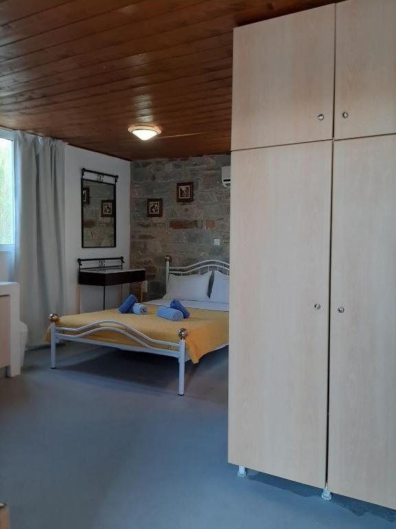 Postel nebo postele na pokoji v ubytování Serifos Sunset