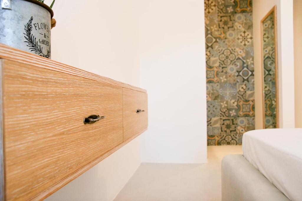 Postel nebo postele na pokoji v ubytování Astropalia Luxury Studios