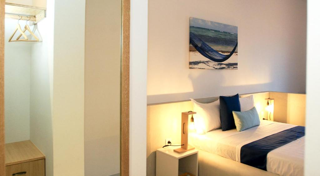 Postel nebo postele na pokoji v ubytování Astropalia Luxury Studios