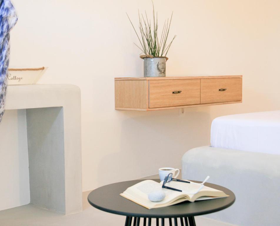 Postel nebo postele na pokoji v ubytování Astropalia Luxury Studios