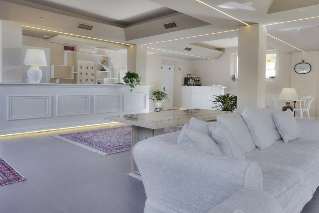 Kuchyň nebo kuchyňský kout v ubytování Relais Le Felci Executive Suite Spa