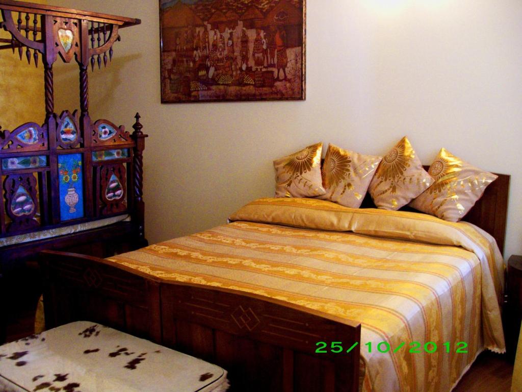 A bed or beds in a room at Bed and Breakfast Angolo Fiorito