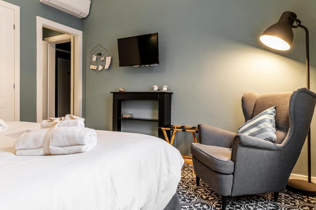 Łóżko lub łóżka w pokoju w obiekcie La Lu cozy rooms 2