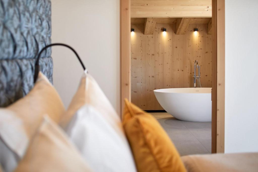 Postel nebo postele na pokoji v ubytování Hotel Marmolada