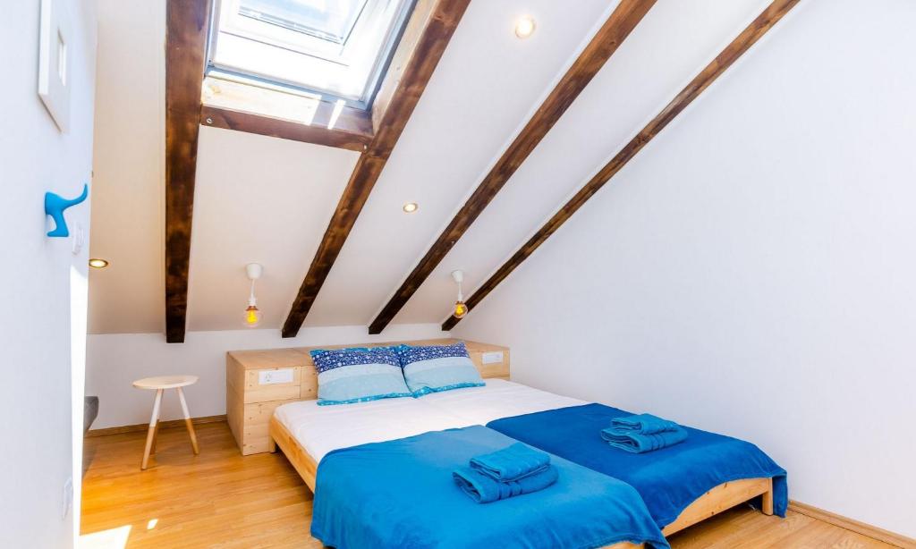 Postel nebo postele na pokoji v ubytování Villa Majkovica