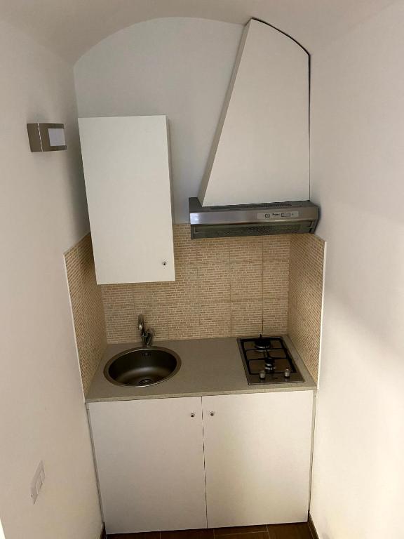 Kuchyň nebo kuchyňský kout v ubytování Casa Vacanze A Due Passi