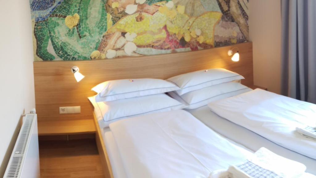 Postel nebo postele na pokoji v ubytování Landgasthof Hirschen