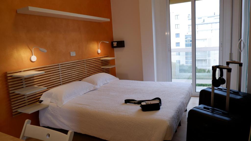 Postel nebo postele na pokoji v ubytování Hotel Venezuela