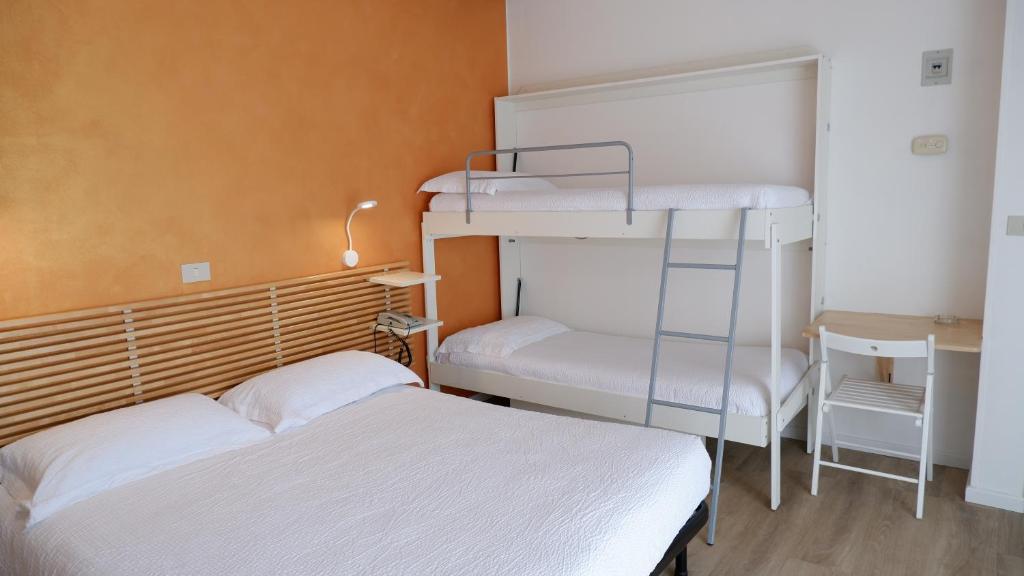 Postel nebo postele na pokoji v ubytování Hotel Venezuela
