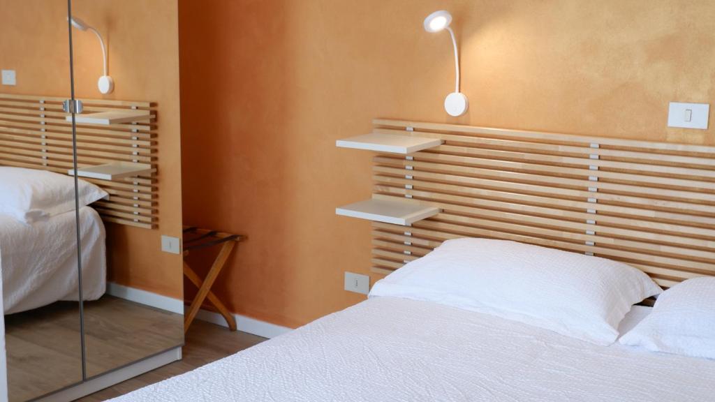 Postel nebo postele na pokoji v ubytování Hotel Venezuela