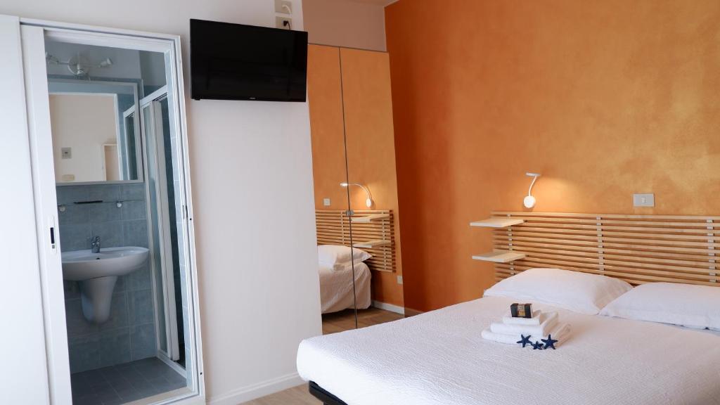 Postel nebo postele na pokoji v ubytování Hotel Venezuela