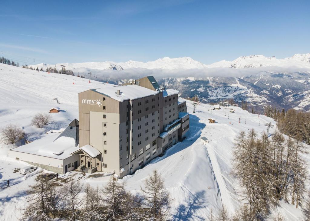 an aerial view of a hotel in the snow at Hôtel Club mmv Plagne 2000 in Aime-La Plagne