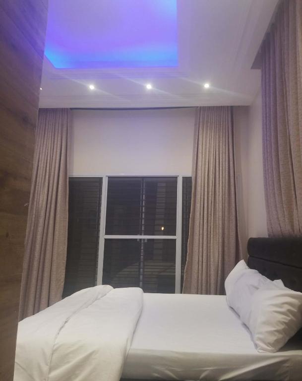 Postel nebo postele na pokoji v ubytování House X