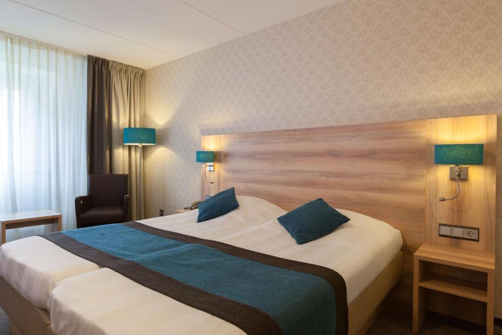Postel nebo postele na pokoji v ubytování Best Western Hotel Baars
