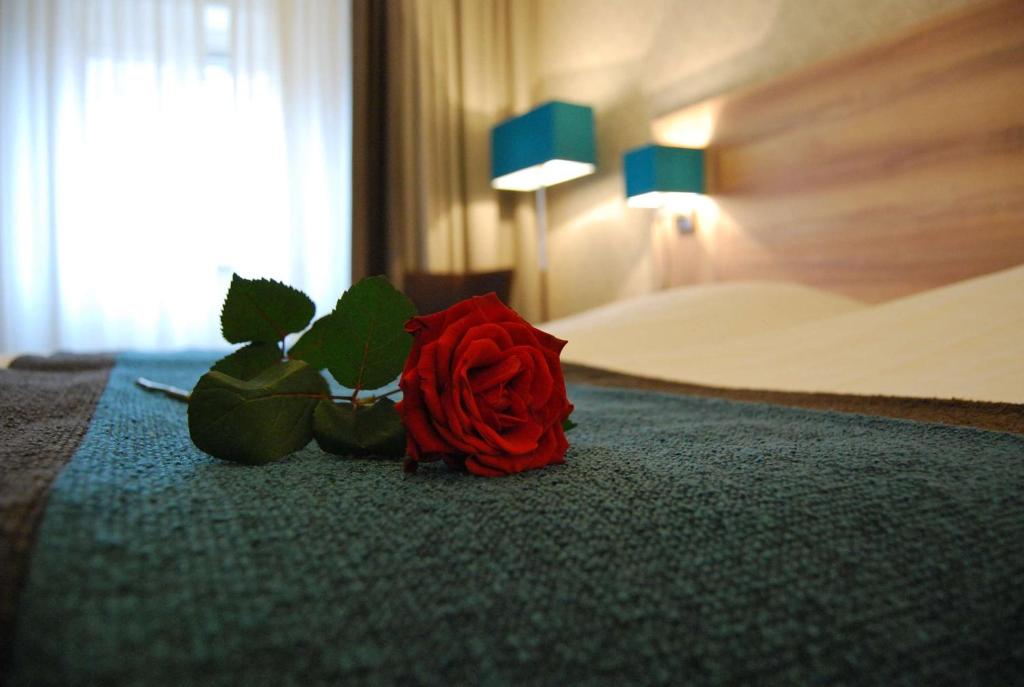 Postel nebo postele na pokoji v ubytování Best Western Hotel Baars