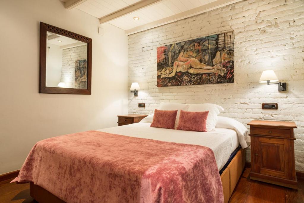 Postel nebo postele na pokoji v ubytování Stay U-nique Apartments Urquinaona