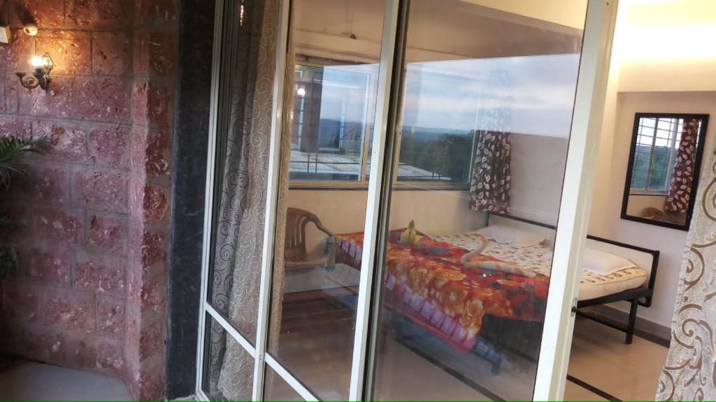 Vamoose Swara Niwas Bungalow - Viervoudige Kamer