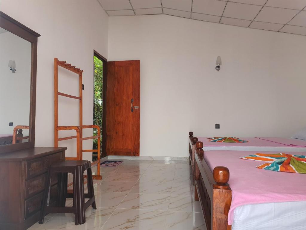 Postel nebo postele na pokoji v ubytování Sa Rest Inn