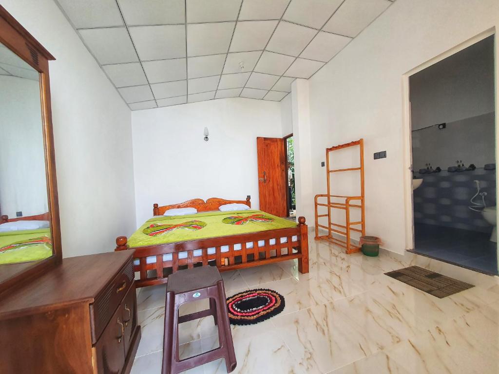 Postel nebo postele na pokoji v ubytování Sa Rest Inn