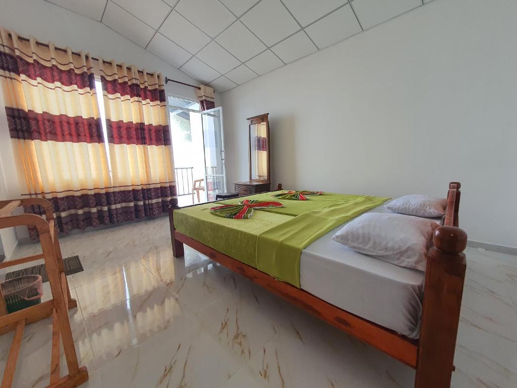 Postel nebo postele na pokoji v ubytování Sa Rest Inn
