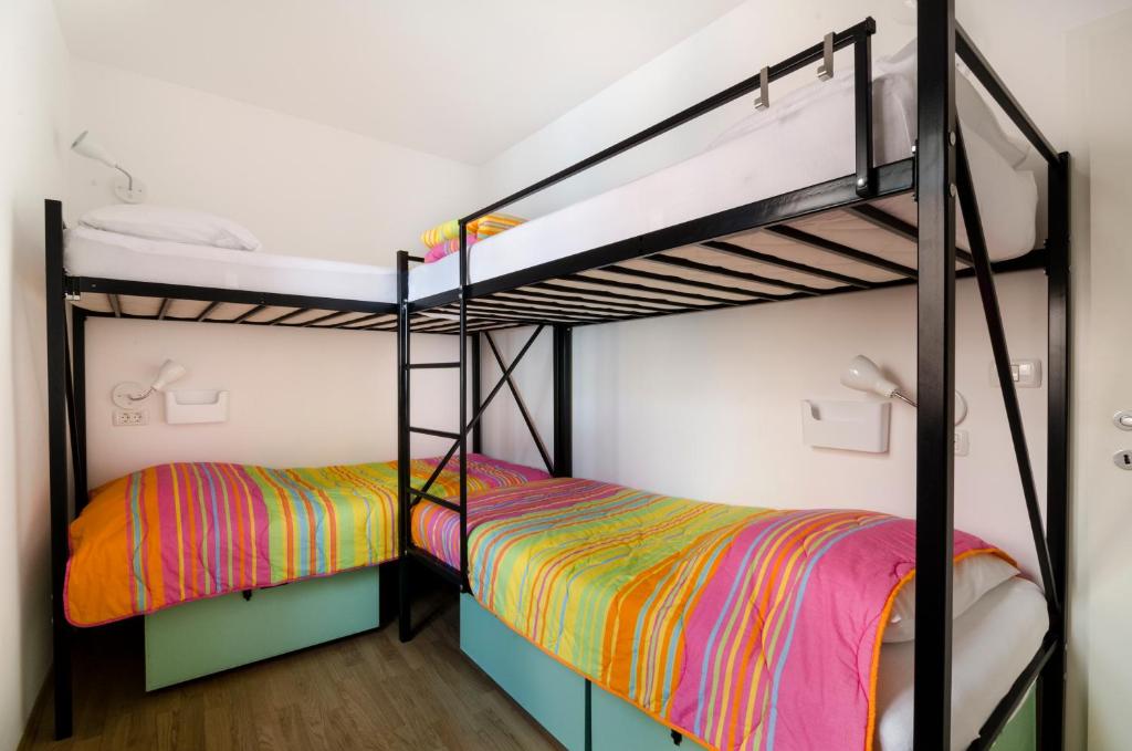 Postel nebo postele na pokoji v ubytování Hostel Alieti