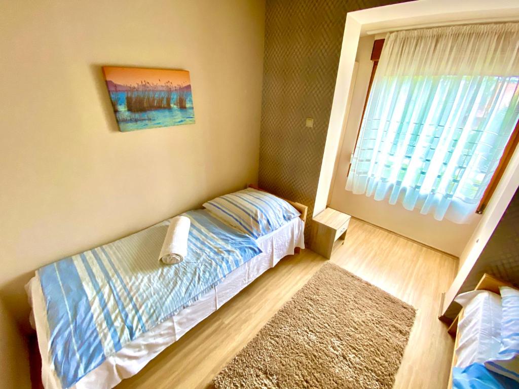 Posteľ alebo postele v izbe v ubytovaní Villa 55 & Pool - Siófok