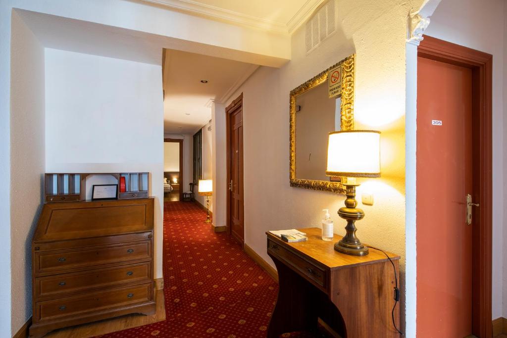 Televízia a/alebo spoločenská miestnosť v ubytovaní Kontxa Guesthouse