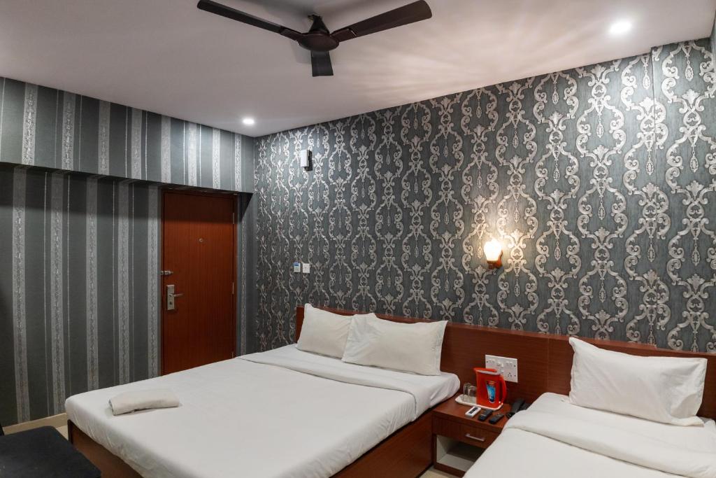 Postel nebo postele na pokoji v ubytování HOTEL PARK VICTORIA
