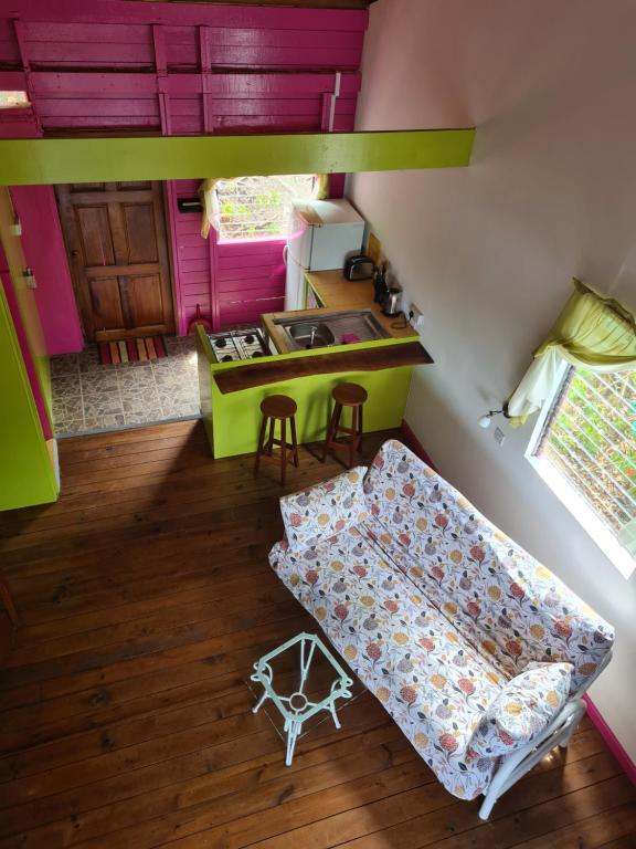Postel nebo postele na pokoji v ubytování Almost Paradise Cottage Retreats