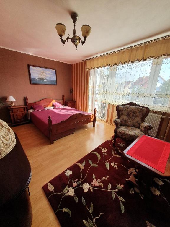 Postel nebo postele na pokoji v ubytování Pensjonat Nostalgia