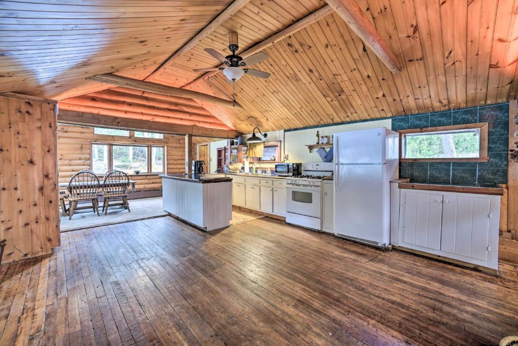 A kitchen or kitchenette at Quiet Saranac Lake Cabin with Deck Pets Welcome!