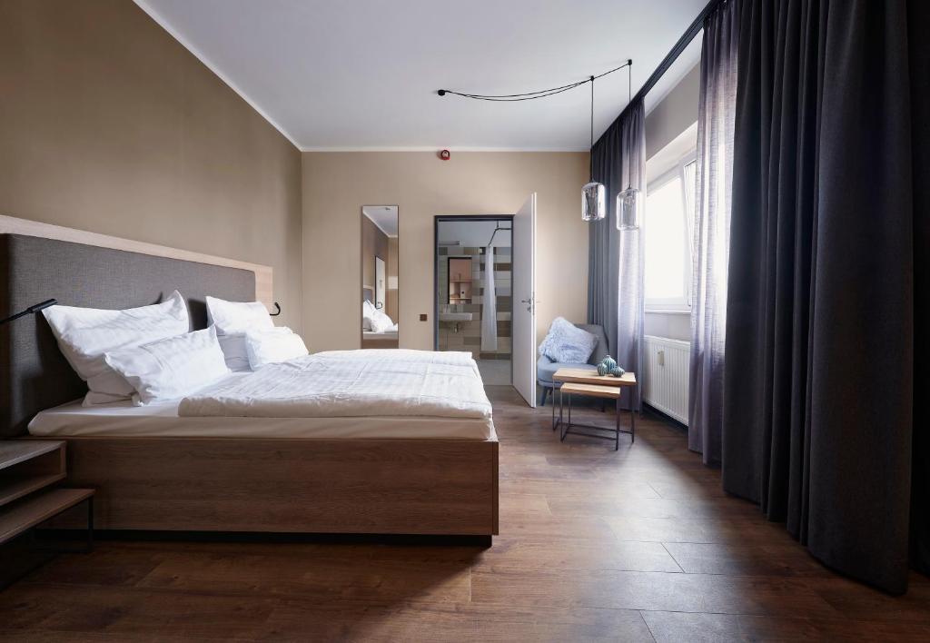 Postel nebo postele na pokoji v ubytování Hotel Marco Polo