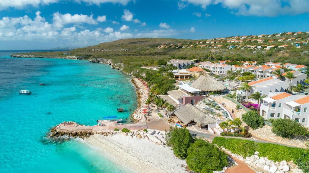 an aerial view of a resort on the beach at Coral Estate Luxury Resort in Willibrordus